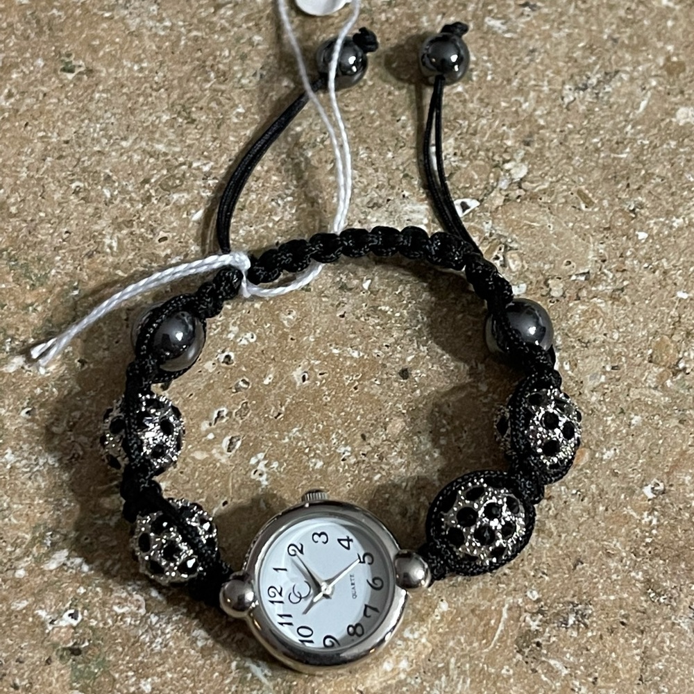 Claire’s black beaded adjustable watch. Cute!